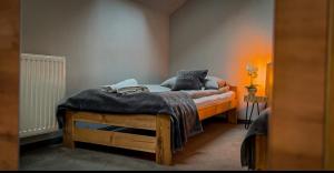 Postel nebo postele na pokoji v ubytování Hostel pod Cisem