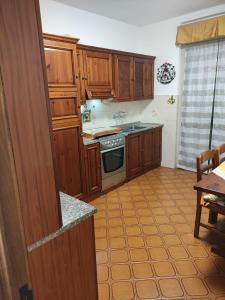 Kuchyň nebo kuchyňský kout v ubytování Casa Manu Spallanzani