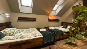 Postel nebo postele na pokoji v ubytování Hostel pod Cisem