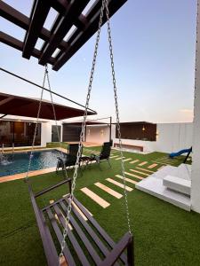 Gallery image of توين شاليهات الغزل in Sayjah