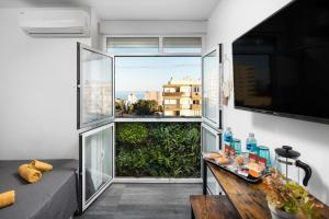 Balkon lub taras w obiekcie Casa Zoe - Apartamentos en Suite Budha - Buenas vibras! Edificio #LasNaciones