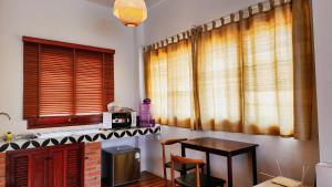 Fotografie z fotogalerie ubytování Baan Bhuwann Holiday Apartment v destinaci Chaloklum