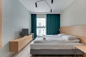 Posteľ alebo postele v izbe v ubytovaní Apartments Old Town Angielska Grobla & by Noclegi Renters