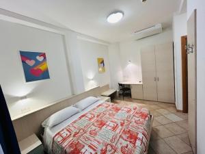 Кровать или кровати в номере Hotel Aurora