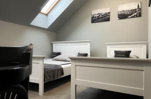 Postel nebo postele na pokoji v ubytování Hostel pod Cisem