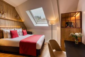 Ліжко або ліжка в номері Hotel du Commerce