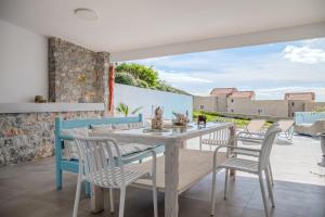 Balkón nebo terasa v ubytování Mythos villas