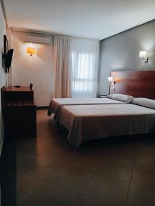 Postel nebo postele na pokoji v ubytování Torrejoven + 37 fotografií