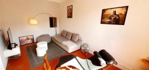 Posezení v ubytování Appartement spacieux & familial.