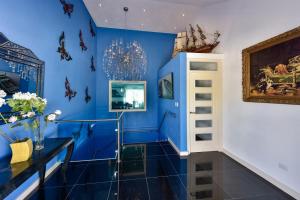 Imagen de la galería de La Casa Piu Bella where the customer is king, en Palm-Eagle Beach