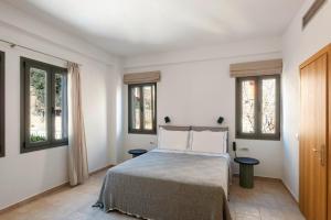 Кровать или кровати в номере Margo Beach Hotel +37 фотографий