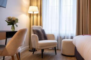 Зона вітальні в Hotel du Commerce