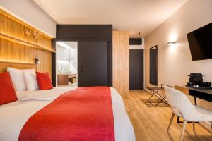 Ліжко або ліжка в номері Hotel du Commerce