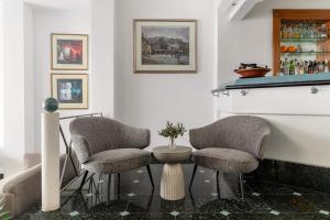 Posezení v ubytování Athos Hotel