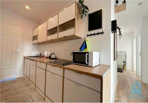 Kuhinja ili čajna kuhinja u objektu Walezy Room - Peaceful Retreat, 10 Minutes to Gdańsk Old Town & Seaside