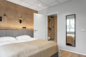 Postel nebo postele na pokoji v ubytování Alva Hotel Brautarholt