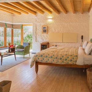 Ένα ή περισσότερα κρεβάτια σε δωμάτιο στο Zanskar Hostel and Rooms