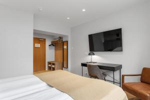 TV a/nebo společenská místnost v ubytování Alva Hotel Brautarholt