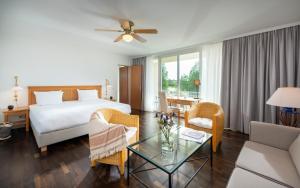 Postel nebo postele na pokoji v ubytování Precise Resort Rügen - Hotel & SPLASH Erlebniswelt + 28 fotografií