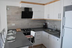 Кухня или мини-кухня в KaşKalkanDenizmanzingJacuzzi with IcatacodDaire
 +21 фотография