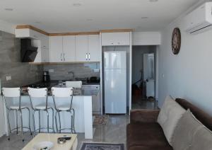 Кухня или мини-кухня в KaşKalkanDenizmanzingJacuzzi with IcatacodDaire
