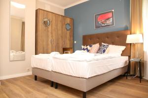 Ένα ή περισσότερα κρεβάτια σε δωμάτιο στο Ferienwohnungen "Burg Freienstein"