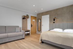 Postel nebo postele na pokoji v ubytování Alva Hotel Brautarholt