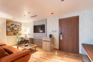 TV o dispositivi per l'intrattenimento presso Hotel Ashwatth