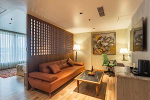 Posezení v ubytování Hotel Ashwatth