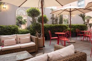 Posezení v ubytování Maxime Boutique Hotel Avenida da Liberdade + 34 fotografií