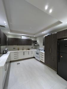 Kuchyň nebo kuchyňský kout v ubytování Prestige Hitting Residence