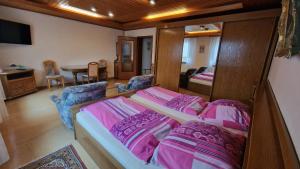 Postel nebo postele na pokoji v ubytování Holiday Home Mergenhofweg