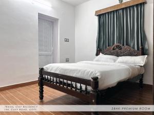 Ένα ή περισσότερα κρεβάτια σε δωμάτιο στο Travel & Stay