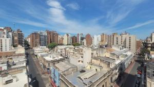 an aerial view of a city with tall buildings at MONOAMBIENTE VILAUT Temporario in Córdoba