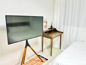 TV a/nebo společenská místnost v ubytování Stay the Shim