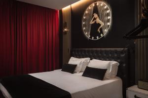 Postel nebo postele na pokoji v ubytování Maxime Boutique Hotel Avenida da Liberdade