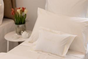 Letto o letti in una camera di Scirocco Boutique Eco Hotel