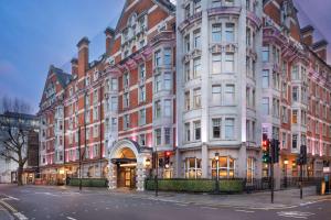 a large building on the corner of a street at Radisson Blu Hotel, London Bloomsbury in London