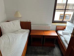 Postel nebo postele na pokoji v ubytování Tieflehner Hof Pitztalhaus Hotel
