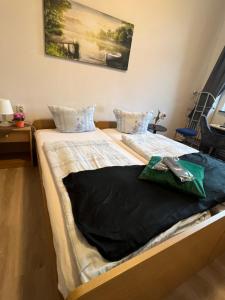 Postel nebo postele na pokoji v ubytování Hotel Steinhoff