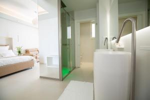 Letto o letti in una camera di Scirocco Boutique Eco Hotel