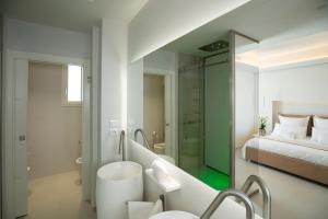 Letto o letti in una camera di Scirocco Boutique Eco Hotel