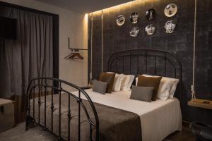 Postel nebo postele na pokoji v ubytování Maxime Boutique Hotel Avenida da Liberdade