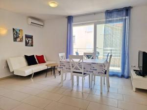 Televízia a/alebo spoločenská miestnosť v ubytovaní Apartment Pavlakovic