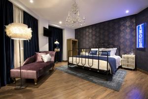 Postel nebo postele na pokoji v ubytování Maxime Boutique Hotel Avenida da Liberdade