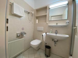 Koupelna v ubytování Adamidis Hotel