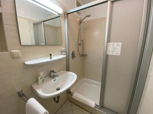 Koupelna v ubytování Adamidis Hotel