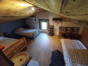 Ένα ή περισσότερα κρεβάτια σε δωμάτιο στο Appartement en village 5 couchages