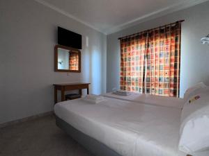 Ένα ή περισσότερα κρεβάτια σε δωμάτιο στο Sunset Bliss in Albufeira - Short walk to Oldtown +33 φωτογραφίες