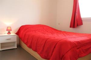 Ένα ή περισσότερα κρεβάτια σε δωμάτιο στο Appt Studio cabine LA ROCHELLE - LR030-A212